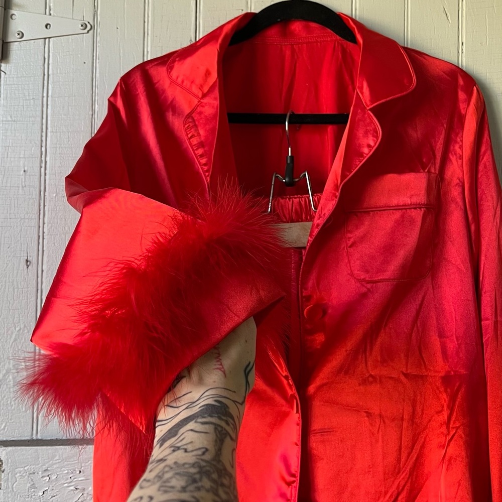 fiery red satin pjs with a gorgeous flamey shimmer to it! feather cuffs !